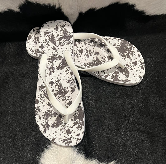 Punchy Cow Print Flip Flops